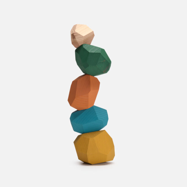 A stock of vibrant multi coloured wooden toy blocks