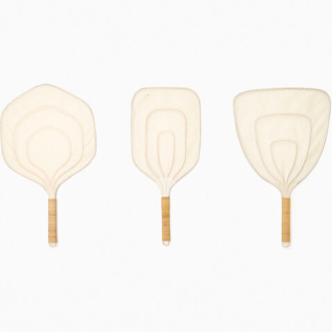 Three non-foldable Japanese paper fans with a rattan handle and frame. Each fan has a different shape. From left to right; hexagonal, rectangular and inverted triangular.