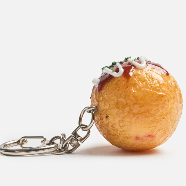 A food replica of takoyaki as a keyring from the side