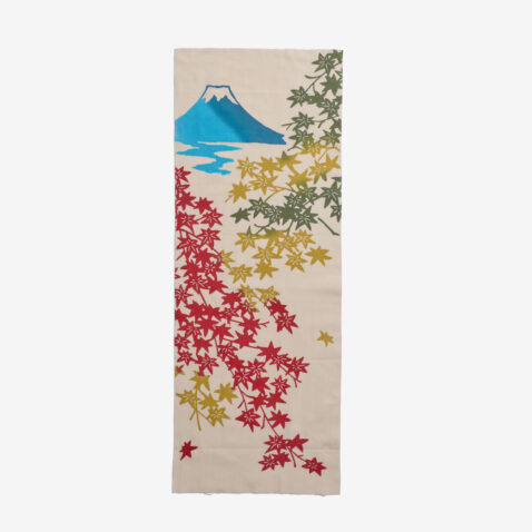 A cotton hand towel dyed with the illustration of light blue Mount Fuji and autumnal leaves in red, yellow and green