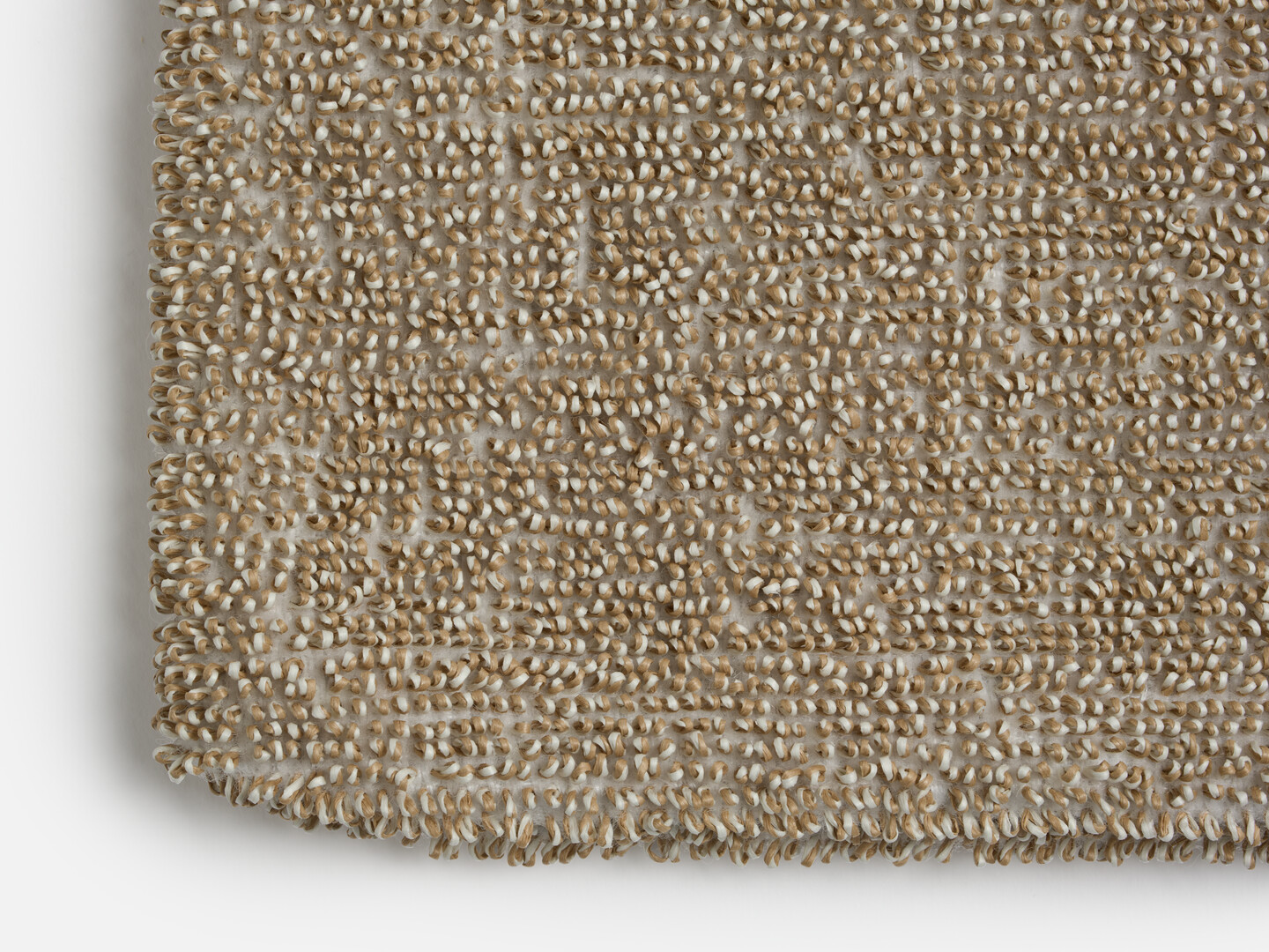 A close up detail of the outside of the Sasawashi Deep Scrubbing Body Mitt