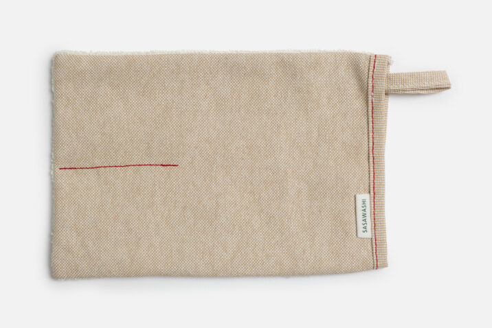 The outer side of the Sasawashi Body Mitt