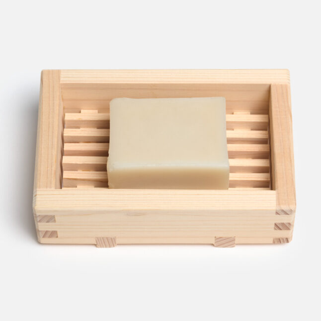 A wooden hinoki soap dish