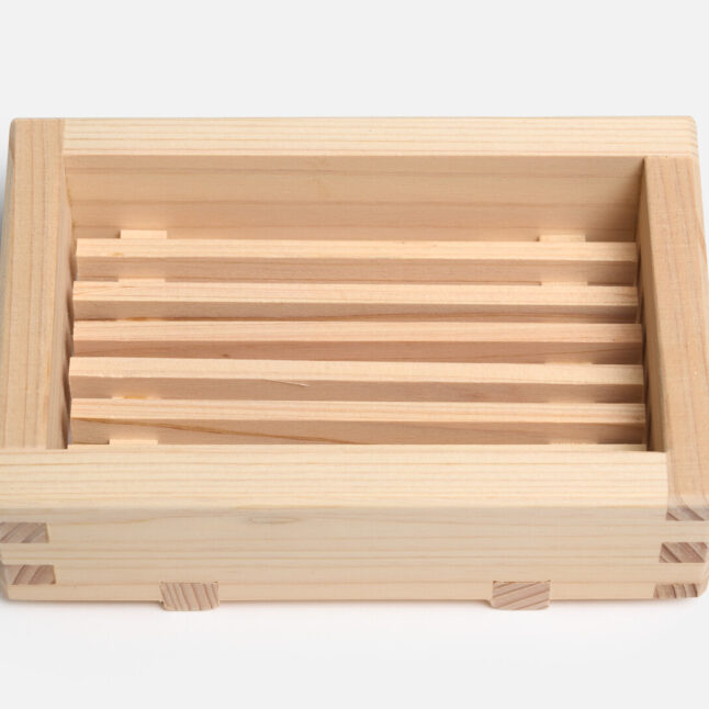 A wooden hinoki soap dish