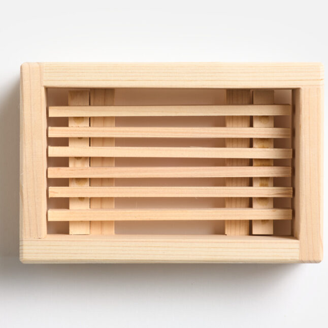 A wooden soap dish from above
