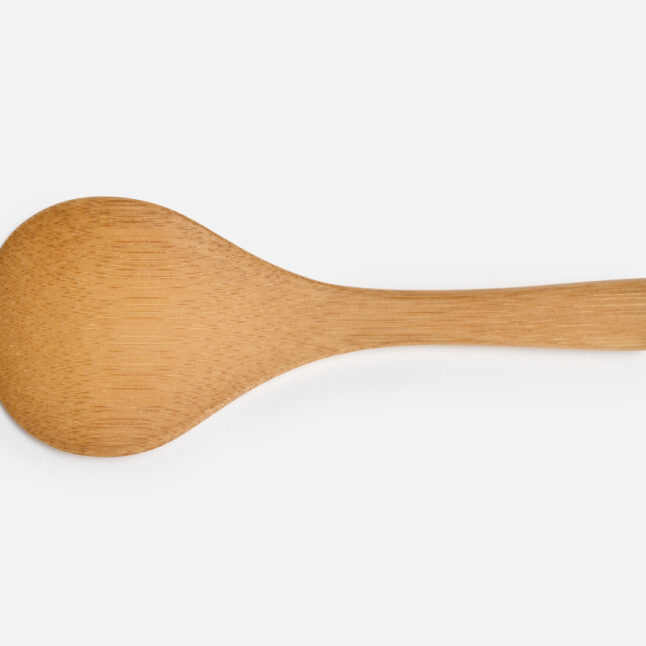 The outer side of the small rice scoop made out of bamboo from Japan House London