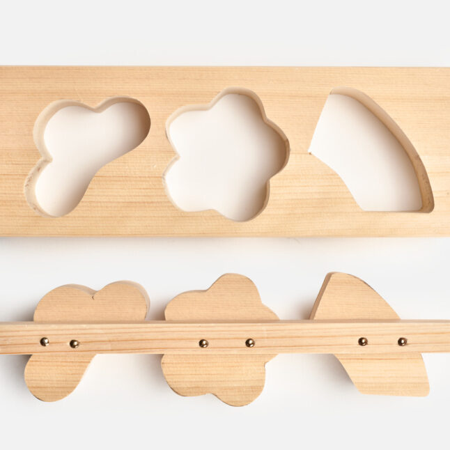 Two piece wooden food mould in three auspicious shapes seen from above