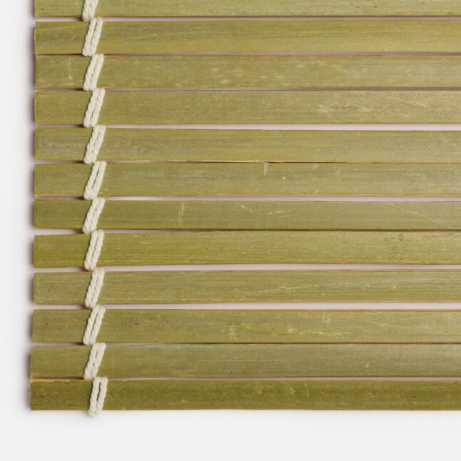 The detailed outer side of the oni sudare rolling mat with long bamboo pieces tied with white cotton string from Japan House London