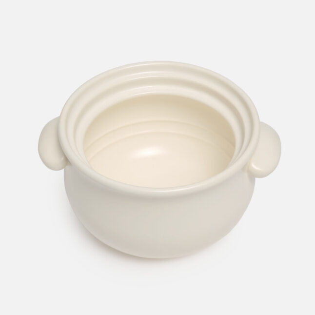 Small white Taiseigama rice pot without outer lid and the inner lid from Japan House London