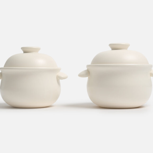 A small and large sized white Taiseigama rice pot from Japan House London