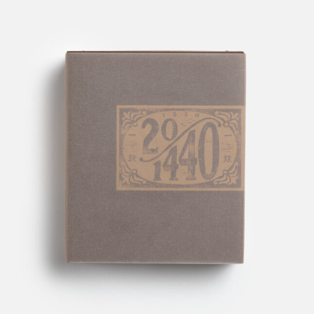 The outer packaging of the incense set, featuring a minimalist design with a muted gray-brown box from Japan House London. The label displays decorative typography reading 
