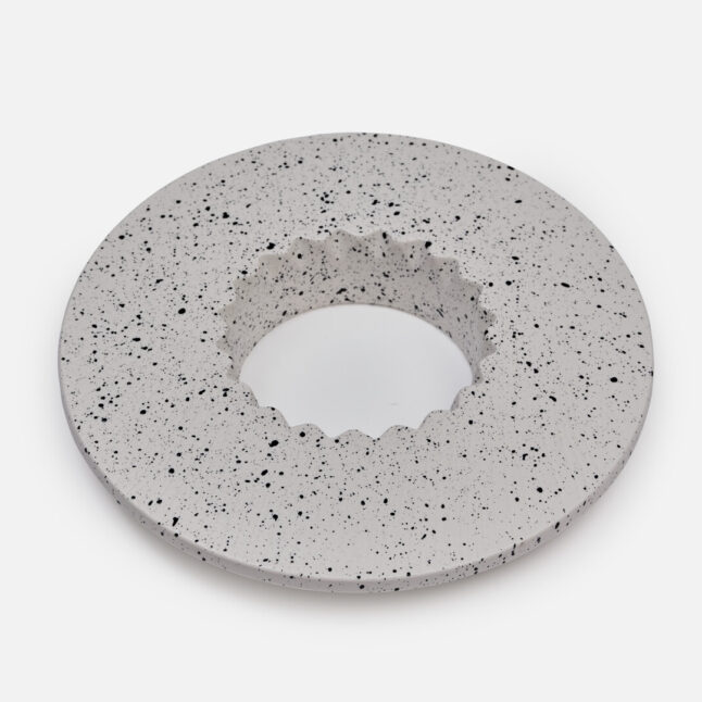 A coffee filter holder with black flecks from Japan House London.