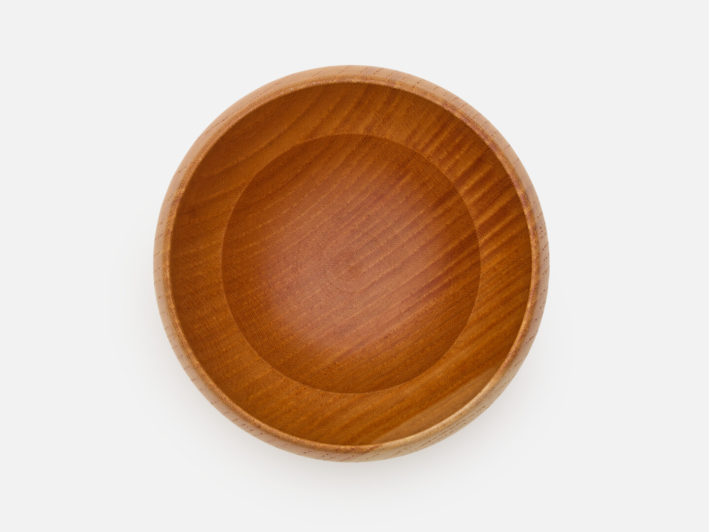 A wooden lacquered tumbler from Japan House London.