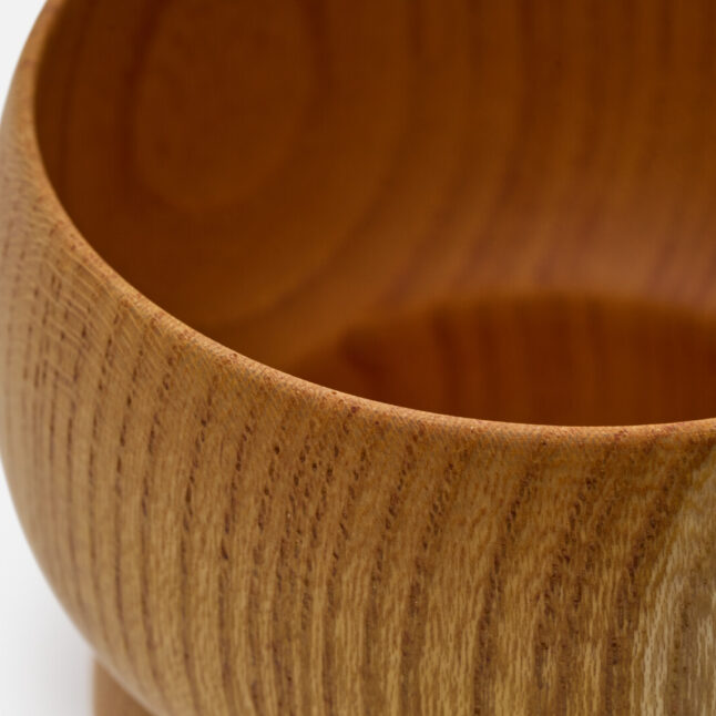 A wooden lacquered tumbler from Japan House London.