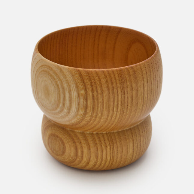 A wooden lacquered tumbler from Japan House London.