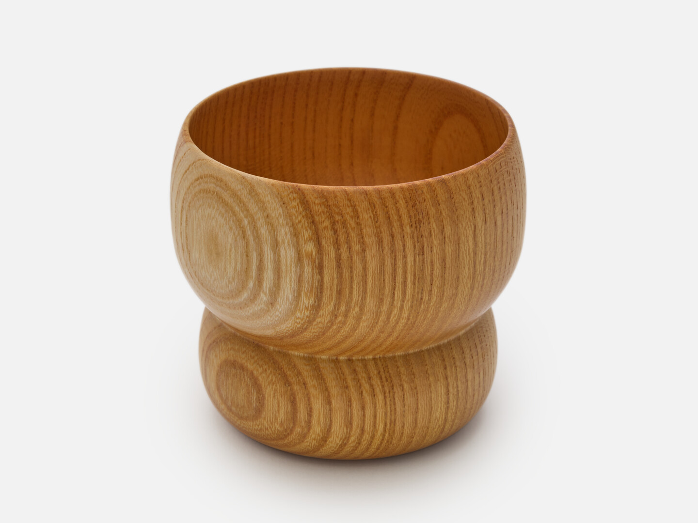 A wooden lacquered tumbler from Japan House London.