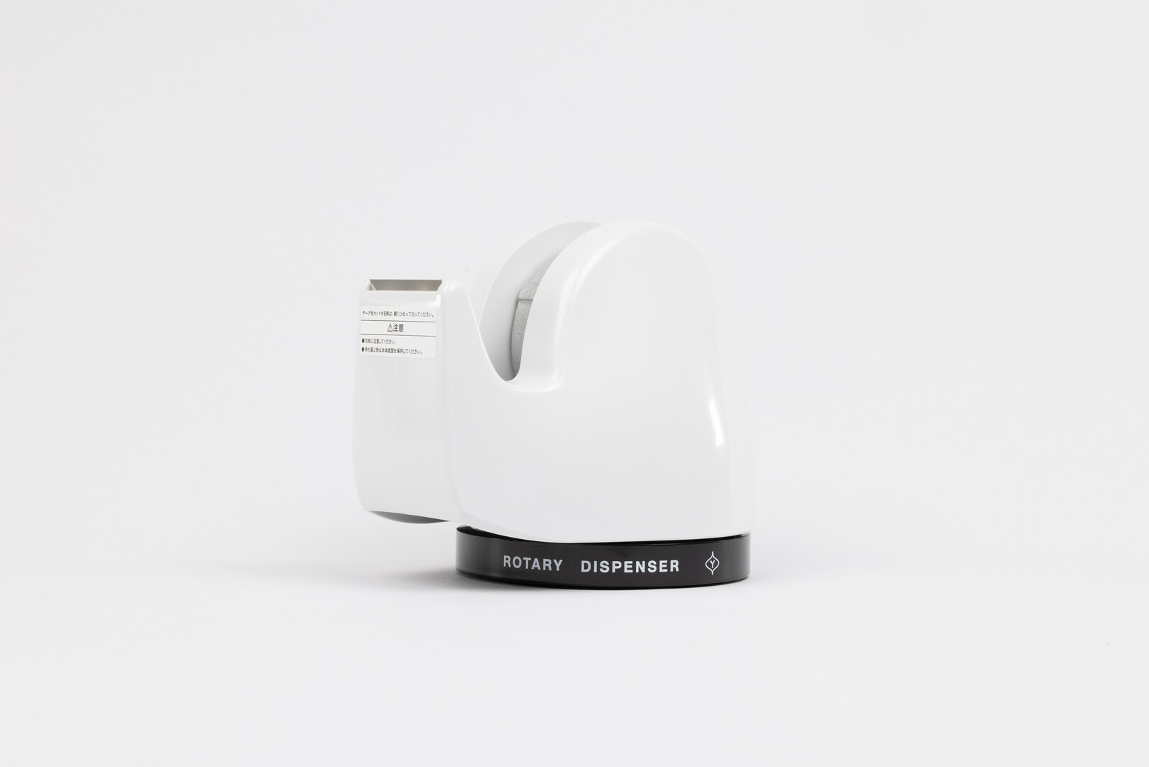 A white tape dispenser with a black base with the words Rotary Dispenser