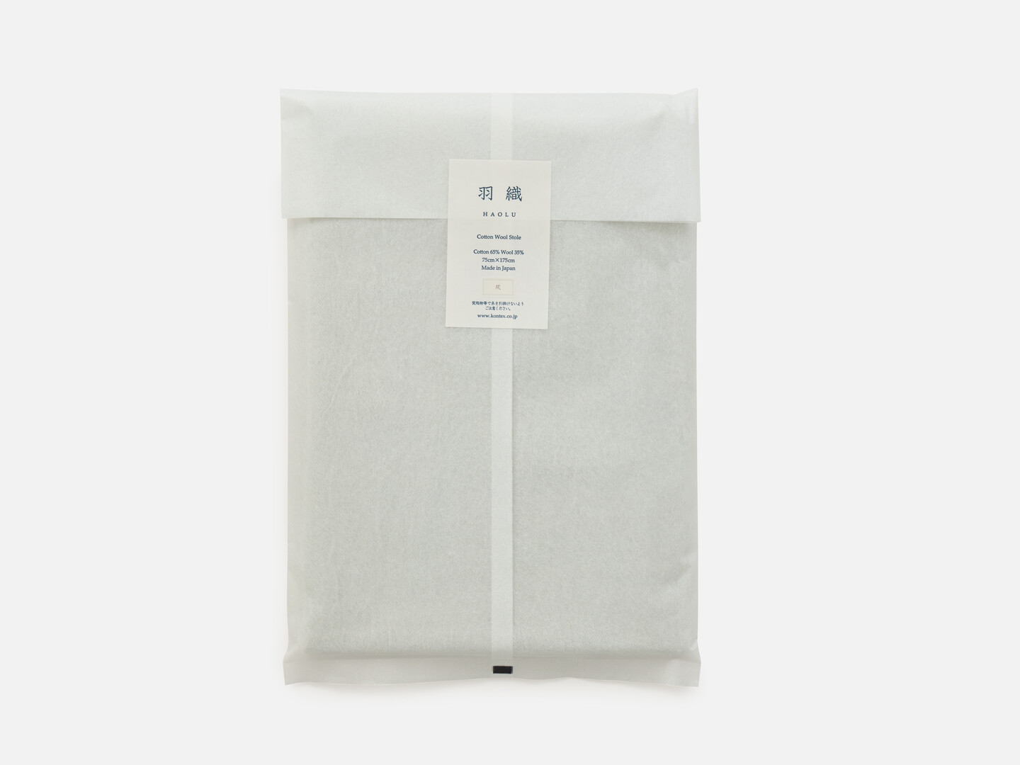 Grey scarf packaged in a white translucent paper