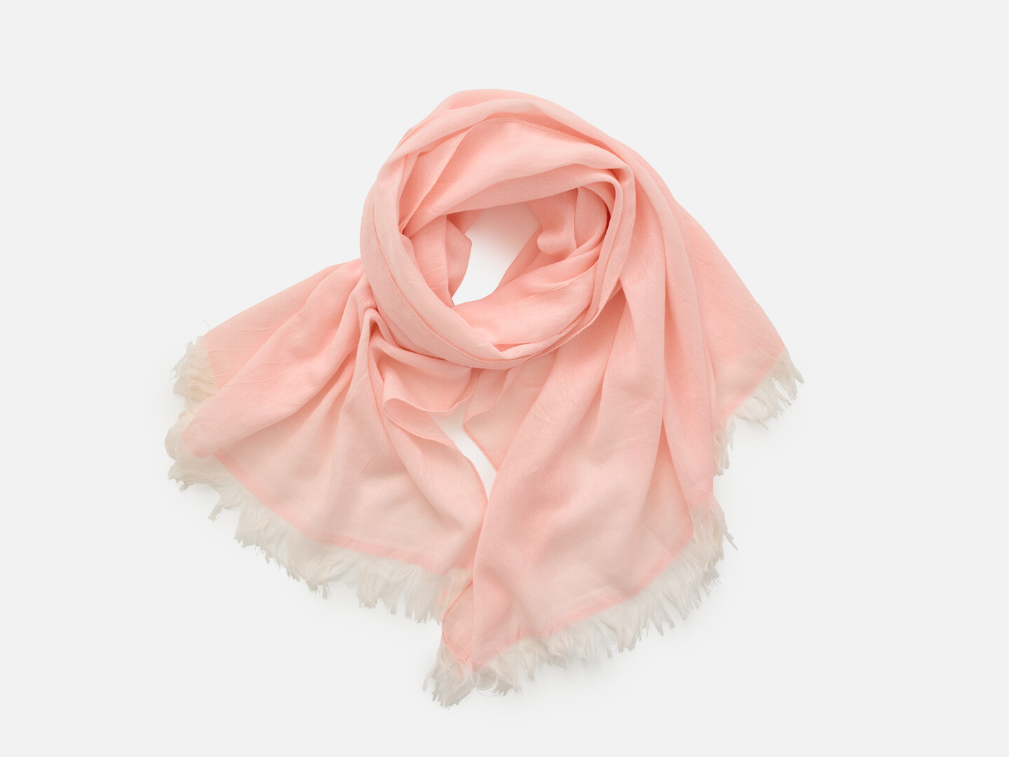Pink scarf placed in a circular position to emulate wrapped around the neck