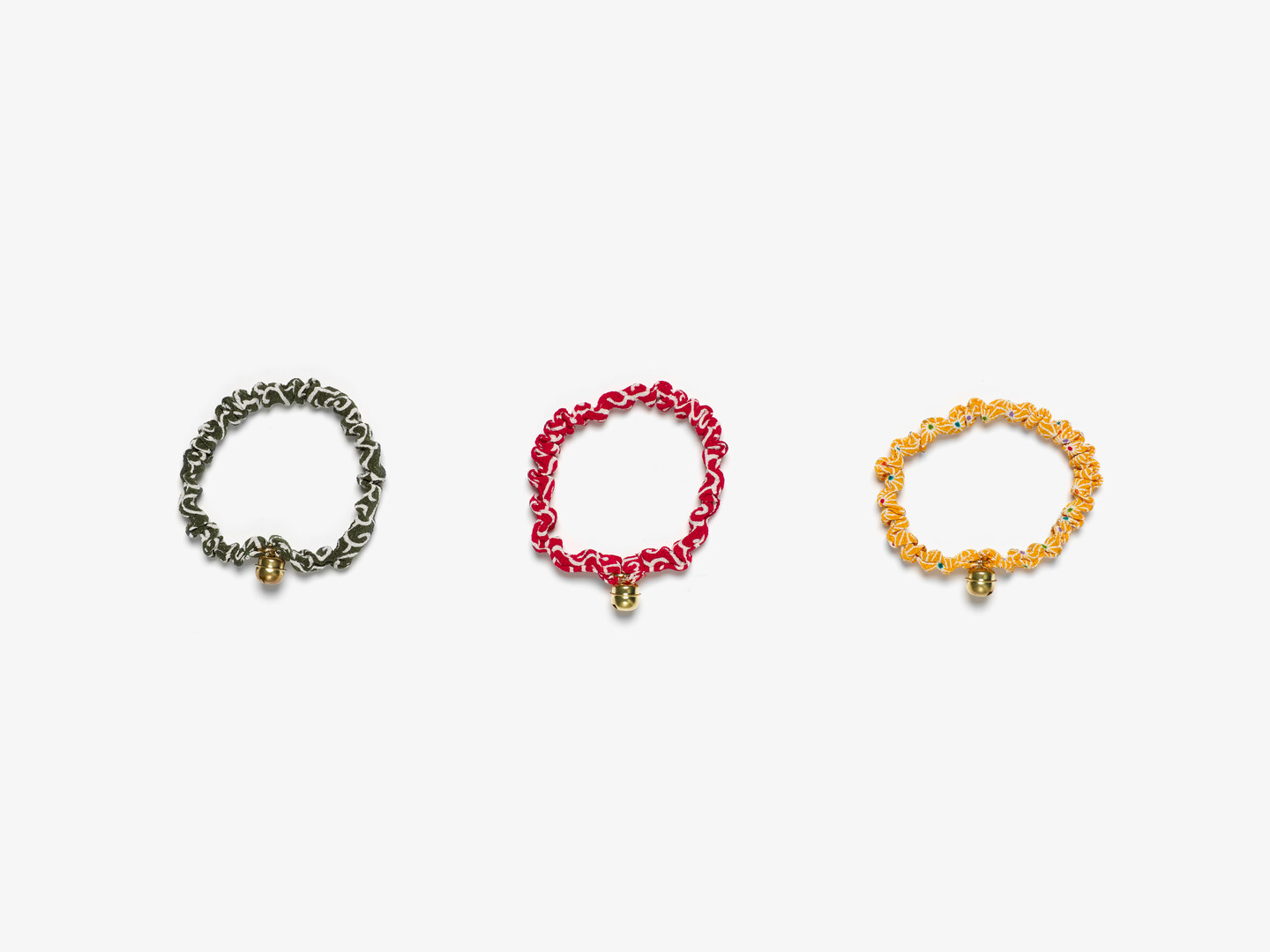 Three cat colours with bells on in green, red and yellow
