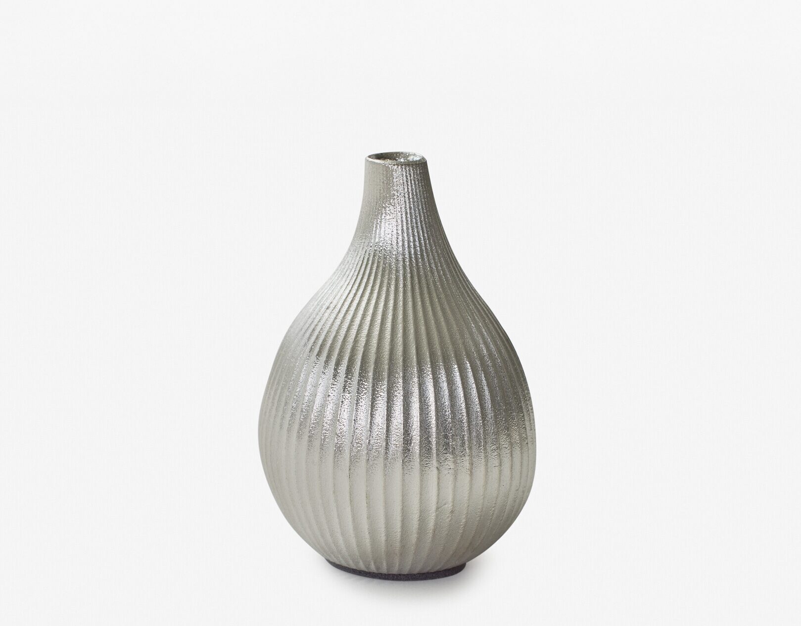 A tin vase shaped similarly to a fig