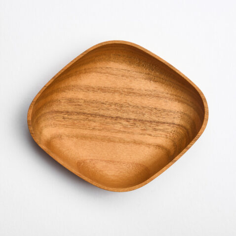 A small diamond shaped wooden plate