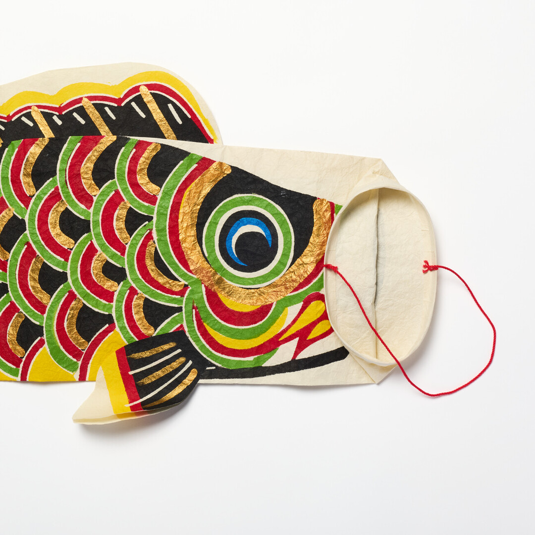 A black washi koinobori with a folded opening