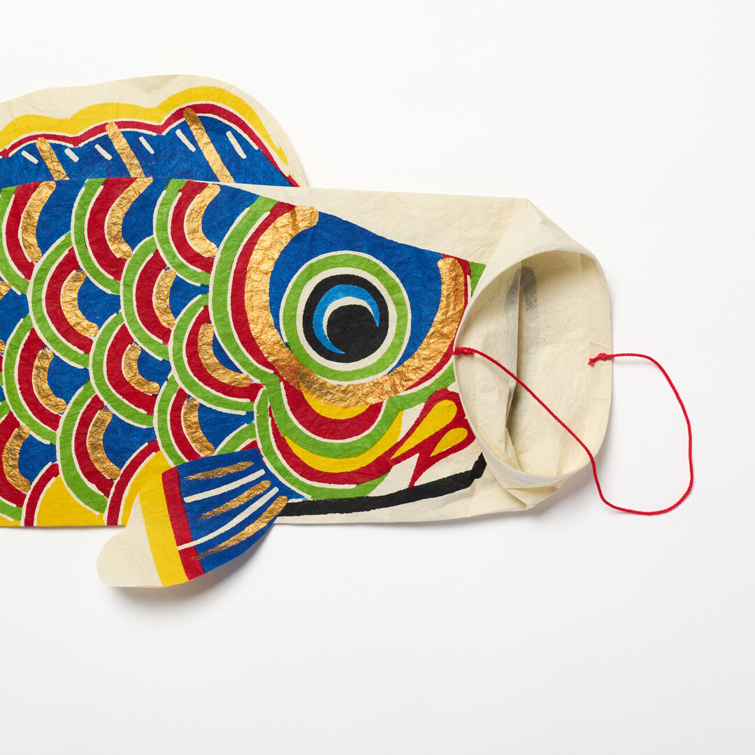 A blue washi koinobori with a folded opening