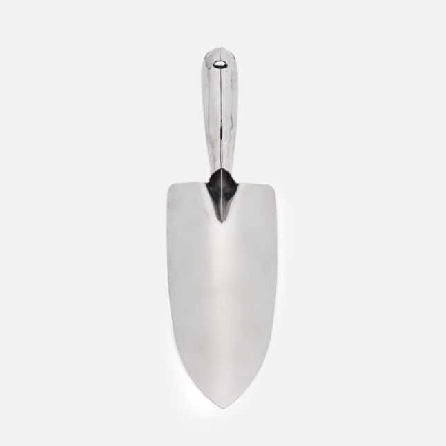 The back of a stainless steel transplanting trowel with a rib to reinforce the handle and the scoop
