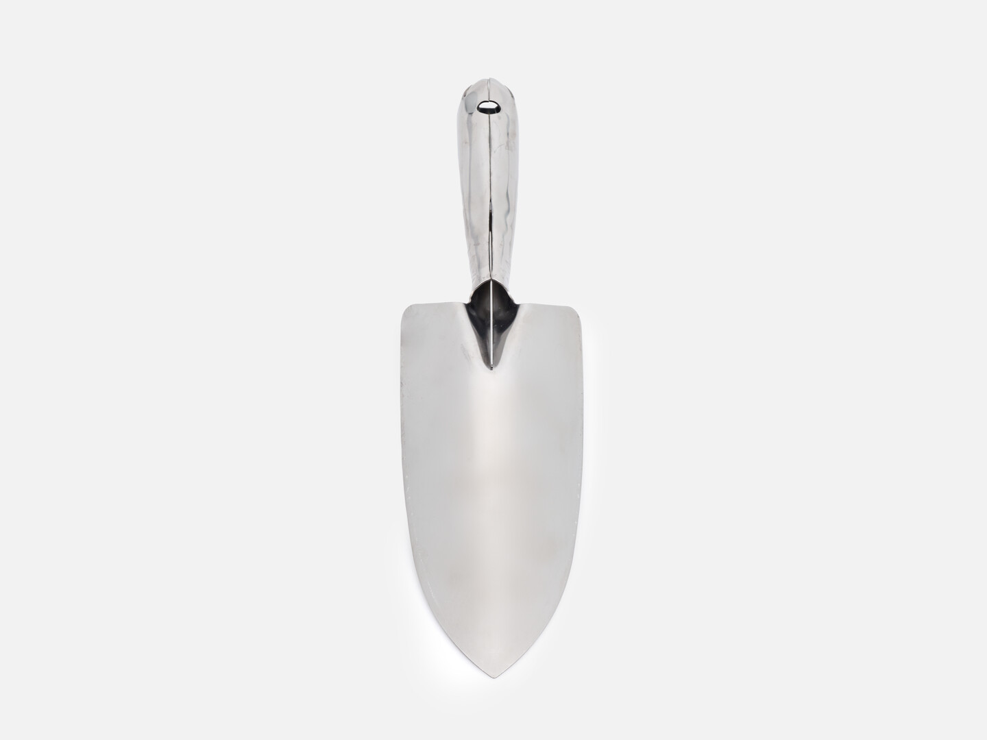 The back of a stainless steel transplanting trowel with a rib to reinforce the handle and the scoop