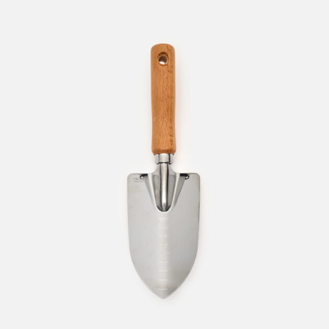A hand shovel with wooden handle