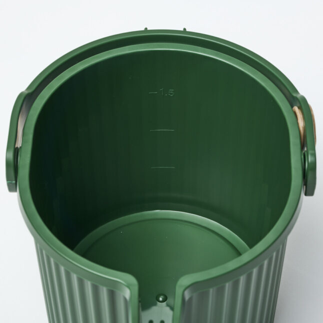 A measure of water inside the green watering can.