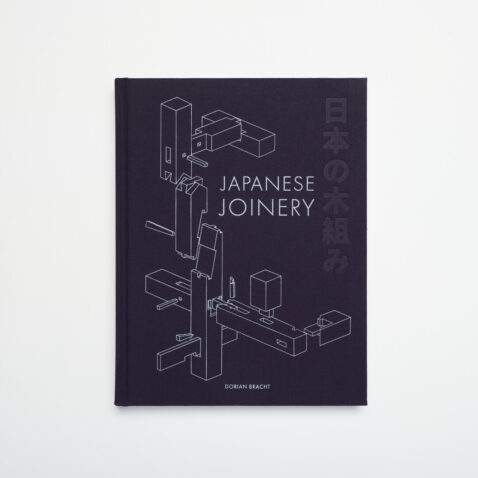 A navy blue book with the words Japanese Joinery and illustrations of joints in white