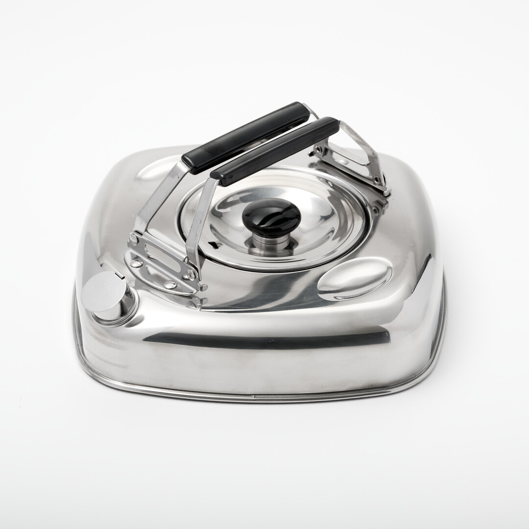 A flat square silver stove kettle with black folding handles