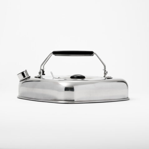 A flat square silver stove kettle with black folding handles