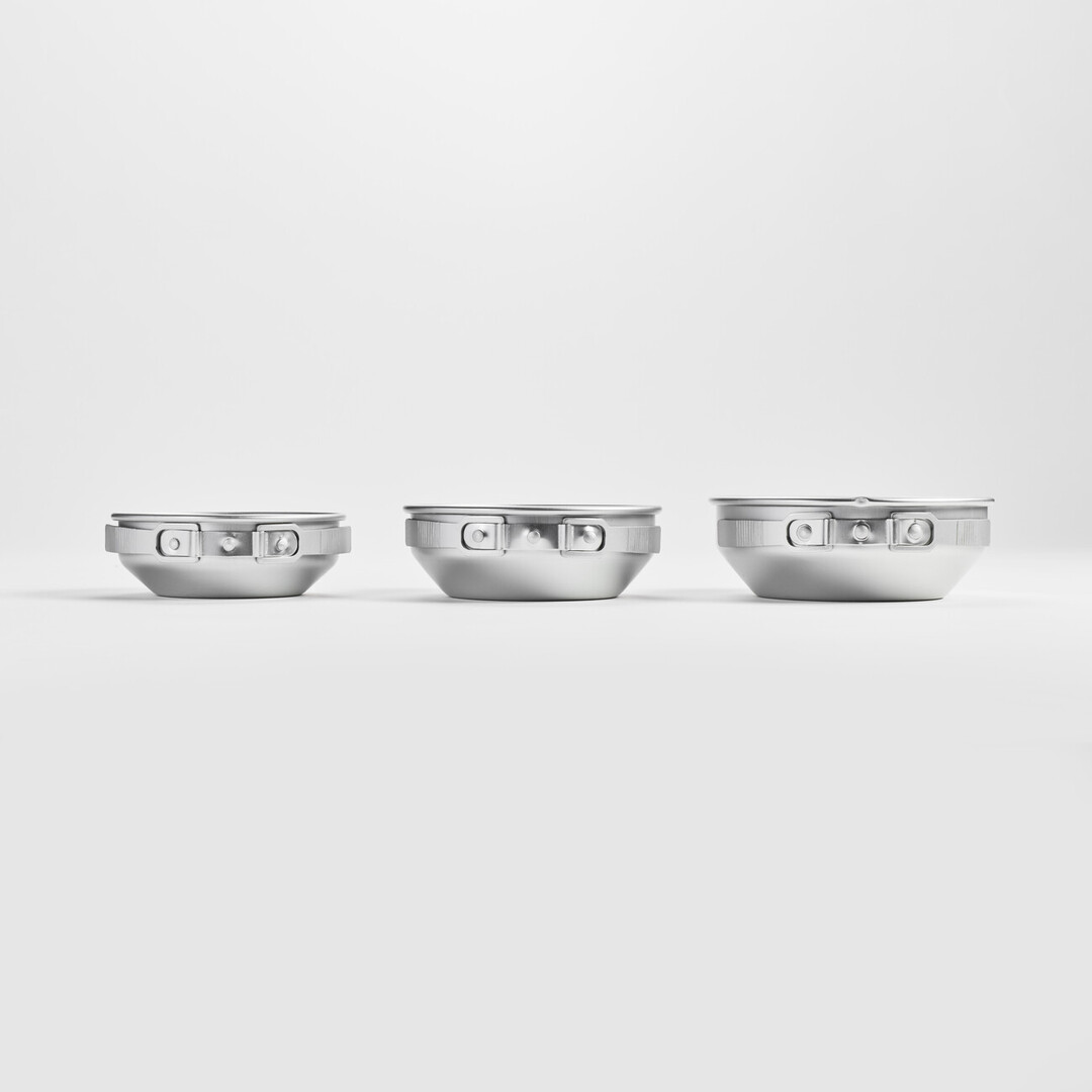 Three aluminium pot with foldable handles collapsed