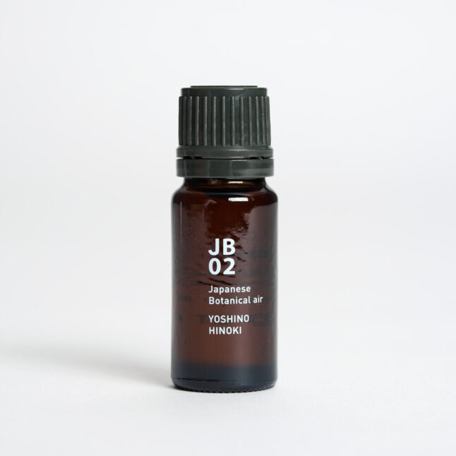 JB02 Yoshino Hinoki aroma oil in a small brown bottle
