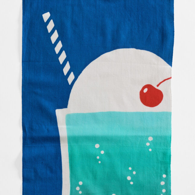 A print of a cream soda with a red cherry and stripy straw