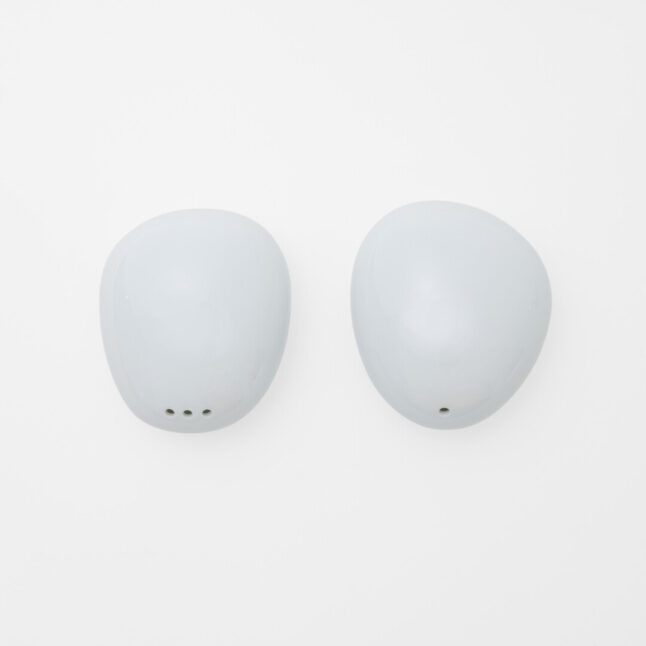A pair of salt and pepper shakers inspired by pebbles made by Hakusan Porcelain