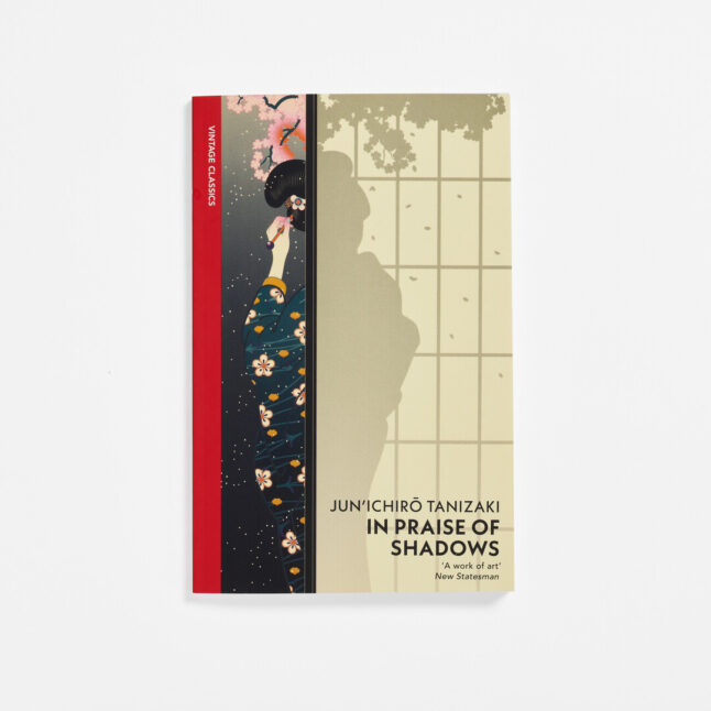 In Praise of Shadows cover with a woman in a kimono standing behind a screen with her back towards the viewer