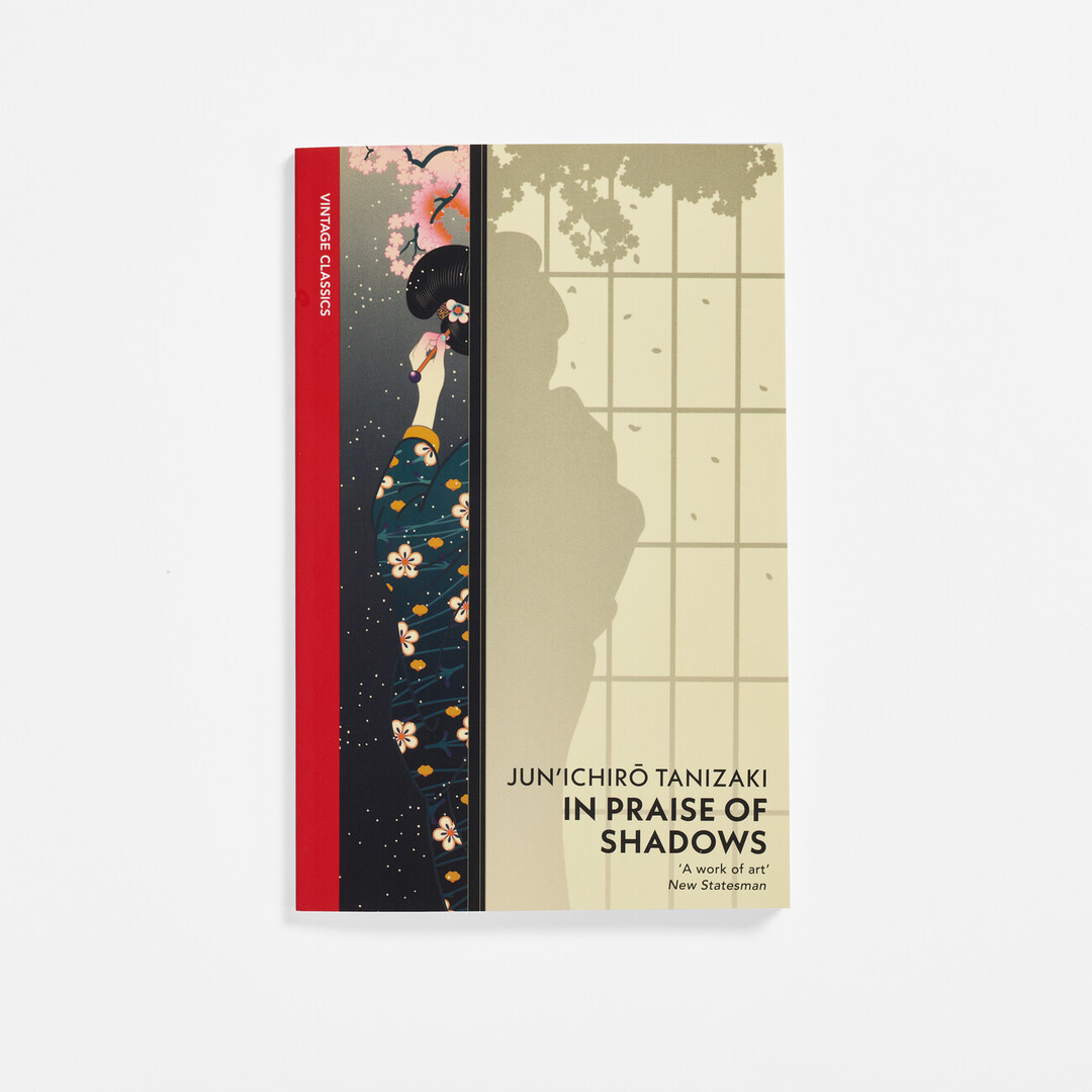 In Praise of Shadows cover with a woman in a kimono standing behind a screen with her back towards the viewer