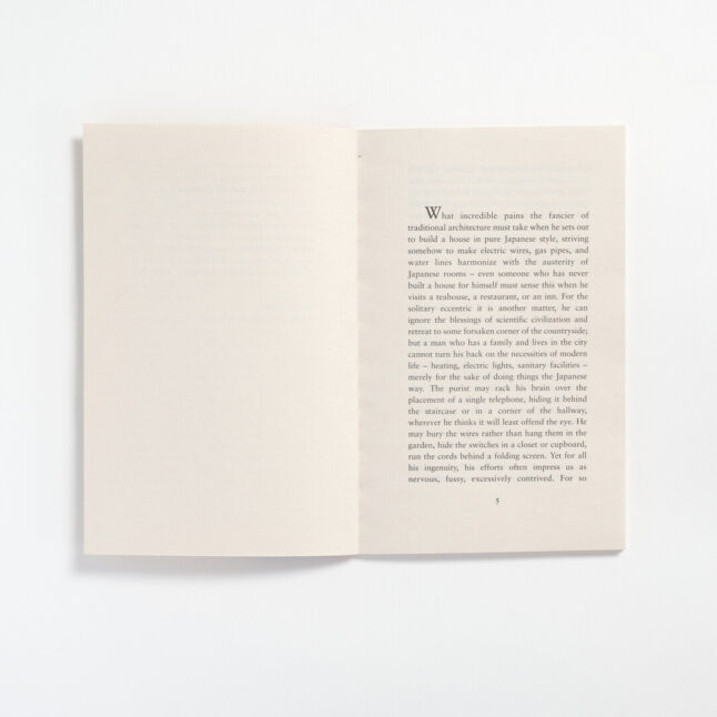 The opening page of book, In Praise of Shadow on the right hand side with the left hand side empty