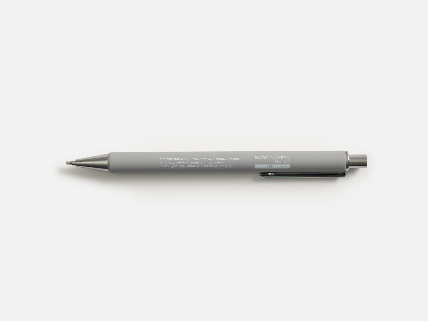 A grey pen with the words Stalogy Water based gel ink ball point pen in white