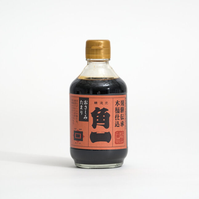Tamari soy sauce in a small bottle with orange label