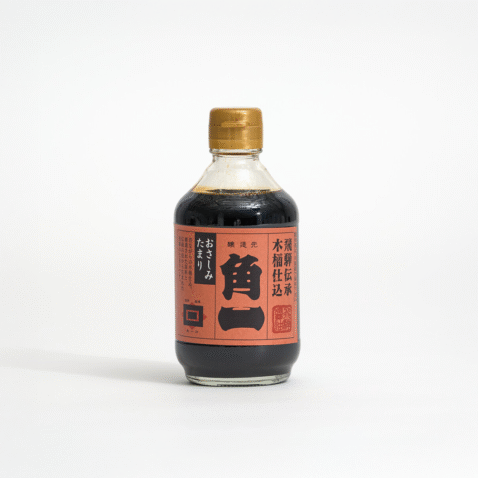 Tamari soy sauce in a small bottle with orange label