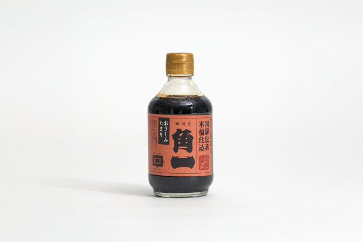 Tamari soy sauce in a small bottle with orange label