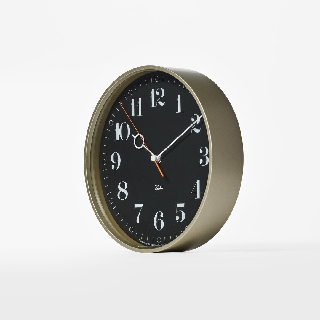 The black wall Riki Ring Clock with silver frame