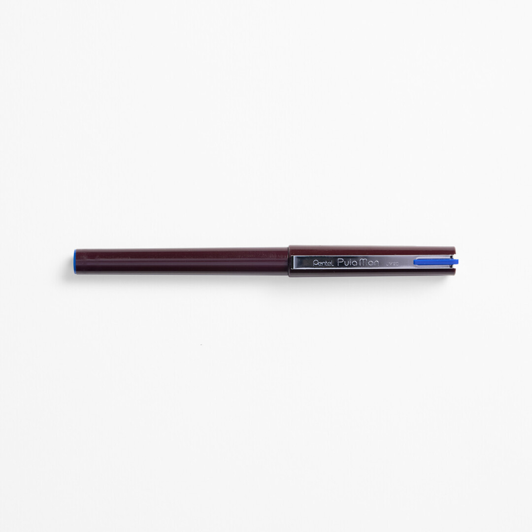 A Pentel Pulaman Pen with blue ink in a maroon body and silver clip function on lid