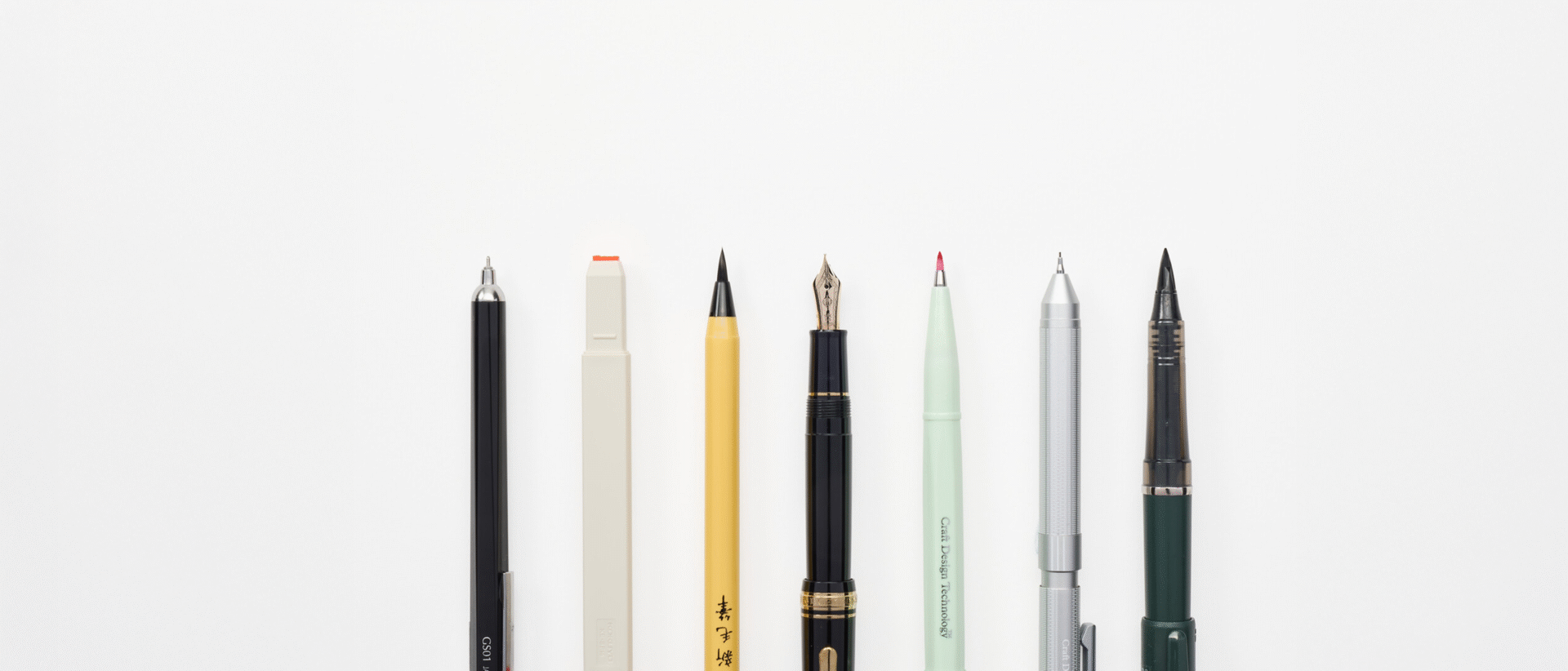 A row of 7 writing utensils from the Desk Essentials Collection from Japan House London