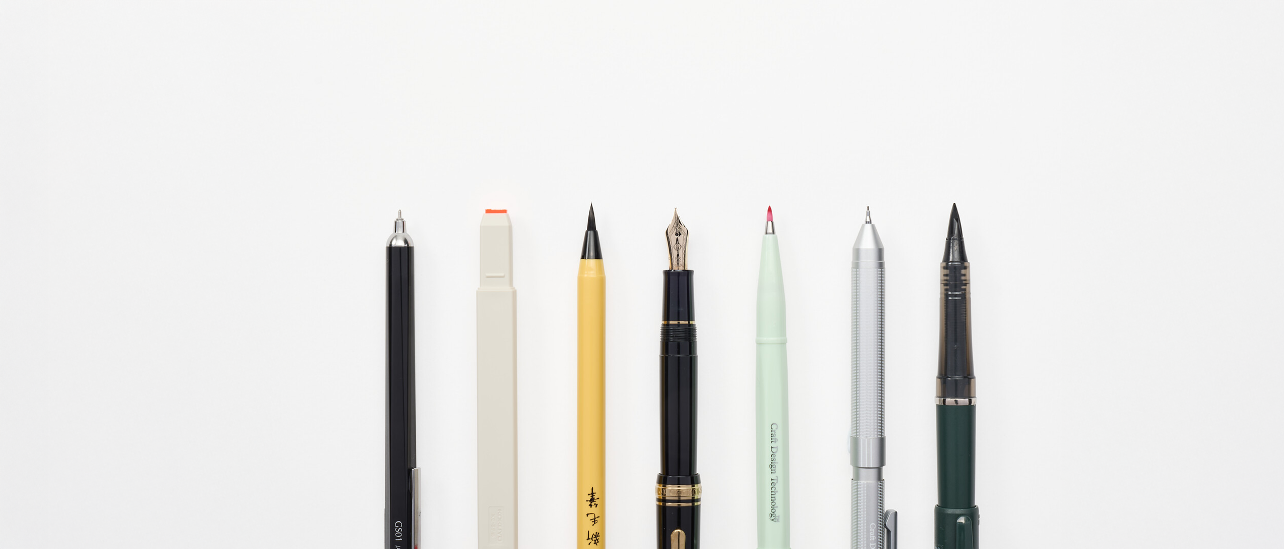 A row of 7 writing utensils from the Desk Essentials Collection from Japan House London